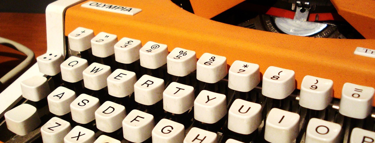 white and yellow old typewriter