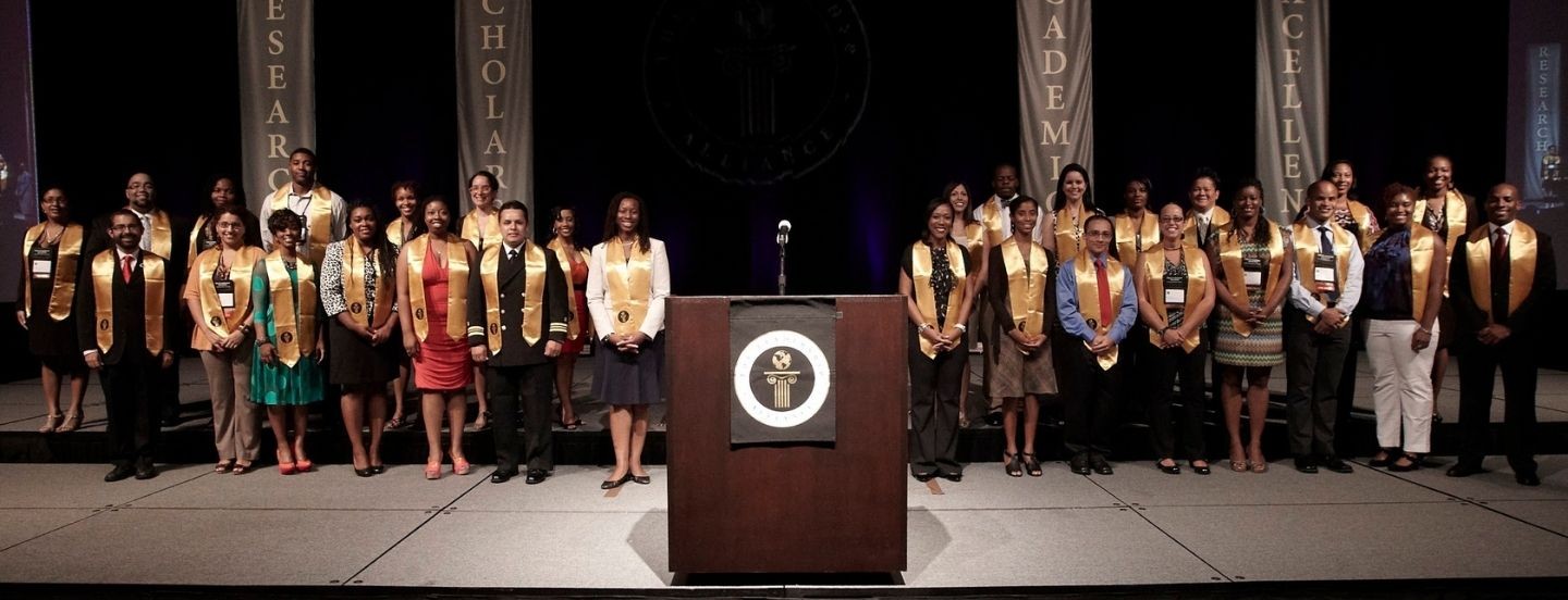 group of people on stage empty podium