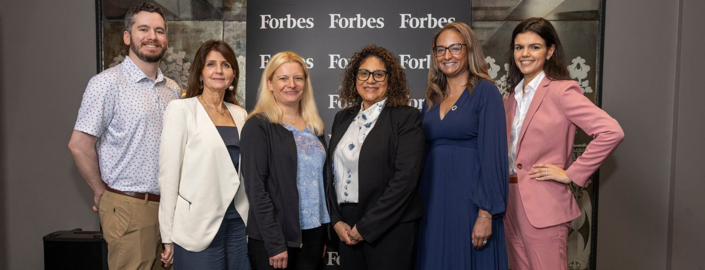 group photo of execxtuive office staff