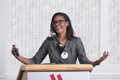 Dr. Medeva Ghee holding a speech 