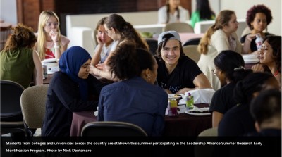 students at table talking