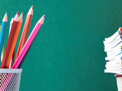 Colored pencils and notebooks