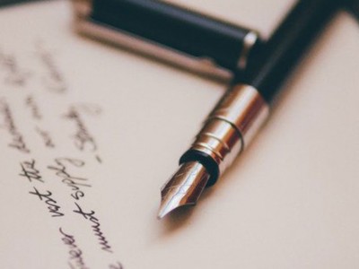 Writing on a sheet of paper