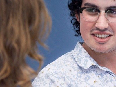 Group of young students working together and discussing