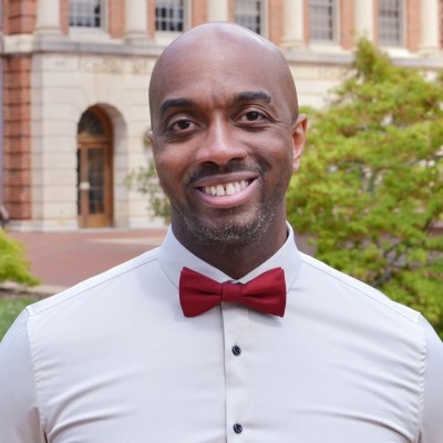 Caleb headshot wearing a bow tie